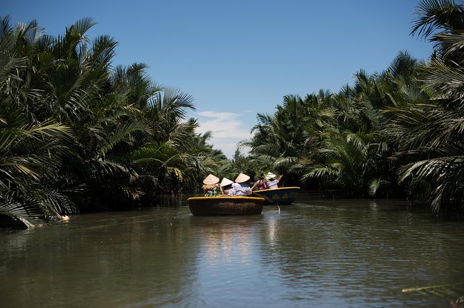 Buffalo riding and Basket Boat Half Day Tour - Entering the Bay Mau Coconut Forest by basket boat