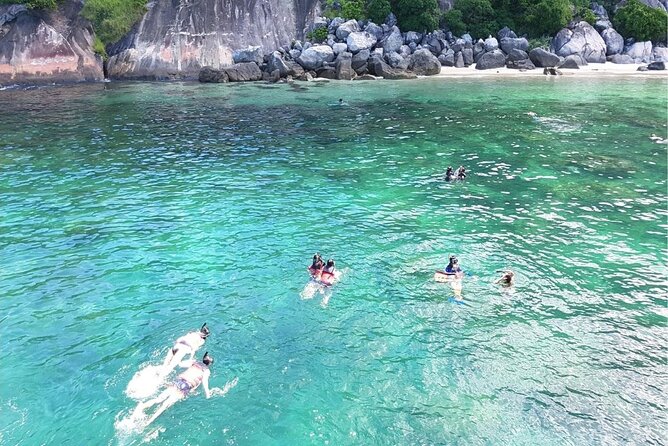 Cham Island Snorkeling - Wonderful Beach - Speedboat Daily Tour - A pagoda, old well, and local market