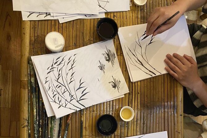 Experience Calligraphy Learning Class in Old Town Hoi An - Adding folk art and watercolor painting