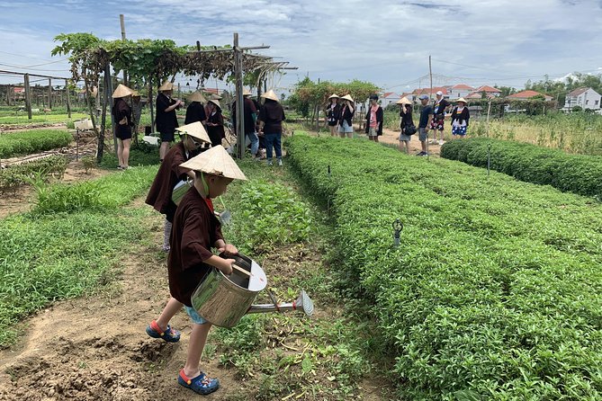 Full Experience Tour: Cooking Class & Basket Boat at Eco-Village - The guides and the family feel