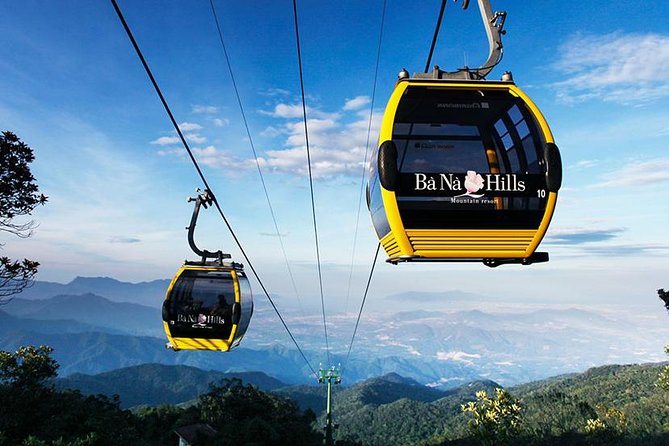 Golden Bridge and Ba Na Hills Full Day From Hoi An City - Riding the cable car above Da Nang