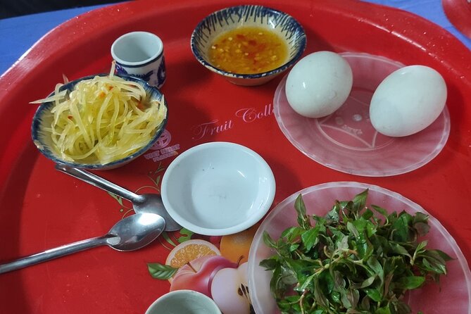 Half-day Private Street Food Tour in Hoi An - Bánh căn near Hoi An Parish Church