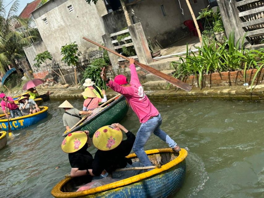 Hoi An Bamboo Basket Boat Ride in Water Coconut Forest - Trying the paddle yourself