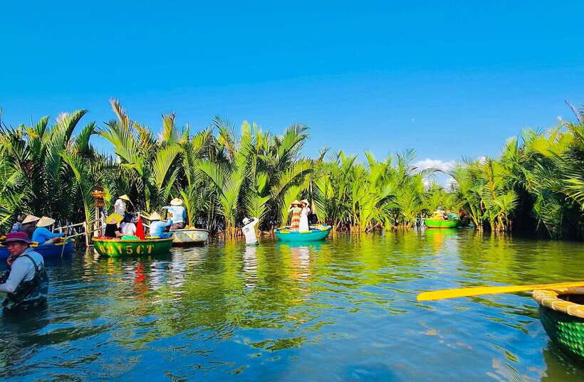 Hoi An : Bamboo Basket Boat Tour and Transfer - Learning to paddle and joining the boat race