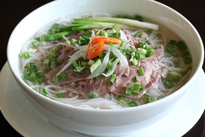 Hoi An: Bay Mau Eco Cooking Tour - Turning rice into rice paper