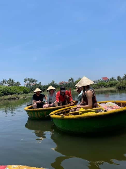Hoi An Coconut Boat, Lantern Making & Cooking Class Organic - Eating lunch in the garden