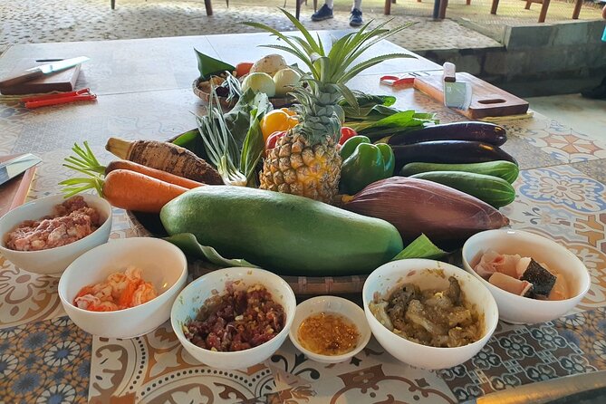 Hoi An Cooking Class With Market Tour and Bamboo Basket Boat Ride - Learning with Lulu, then eating lunch