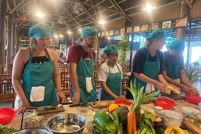 Hoi An Cooking Class With Market Tour and Bamboo Basket Boat Ride - Crossing Bay Mau Coconut Village by basket boat