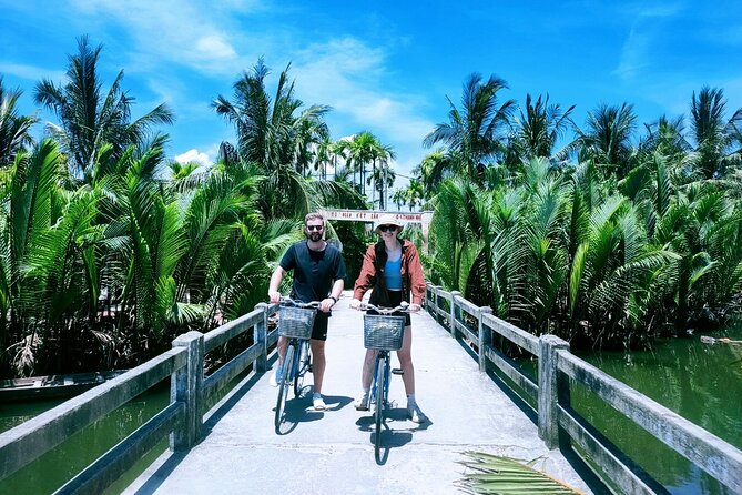 Hoi An Eco-Biking Tour - Working the gardens at Tra Que