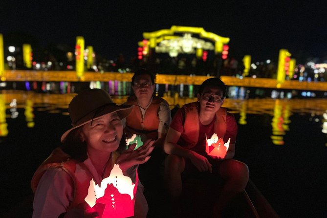 Hoi An Food Trail by Night with Boat Trip - Lantern streets, a sampan, and a small wish