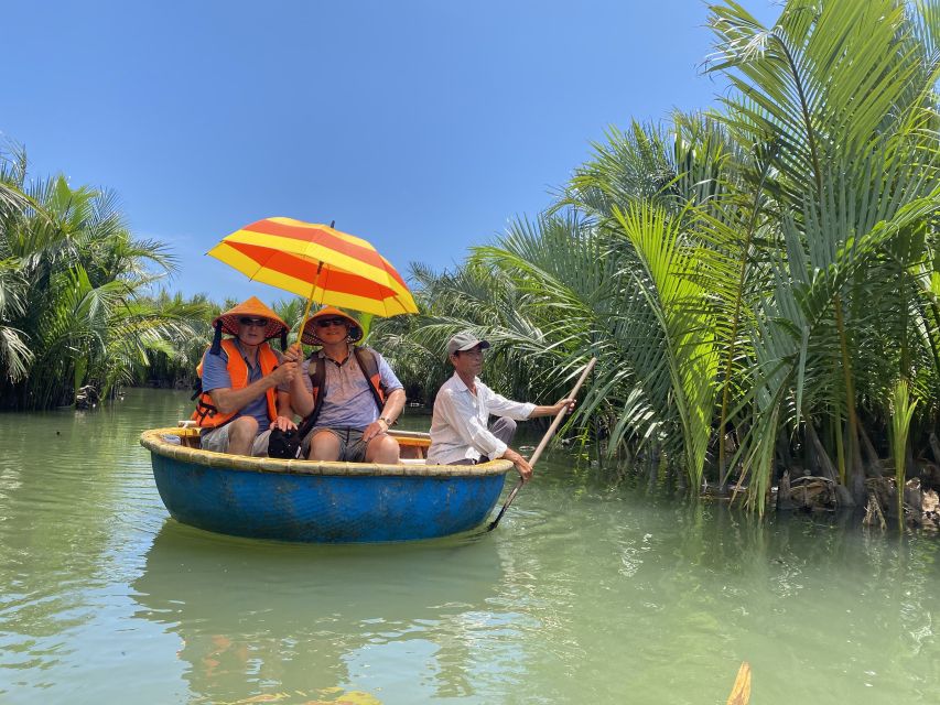 Hoi An Highlights and Hidden Gems Tour by Vespa - A bamboo basket boat in the water coconut forest