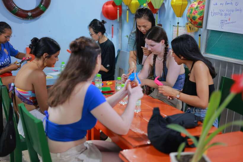 Hoi An : Lantern Boat Ride & Flower Lantern Making Class. - Releasing your lantern from the boat