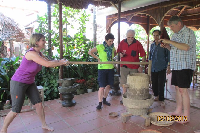 Hoi An Rice Farm Tour and Buffalo Riding with Local Home Meal - Putting on Farmer Clothes and Entering the Mud