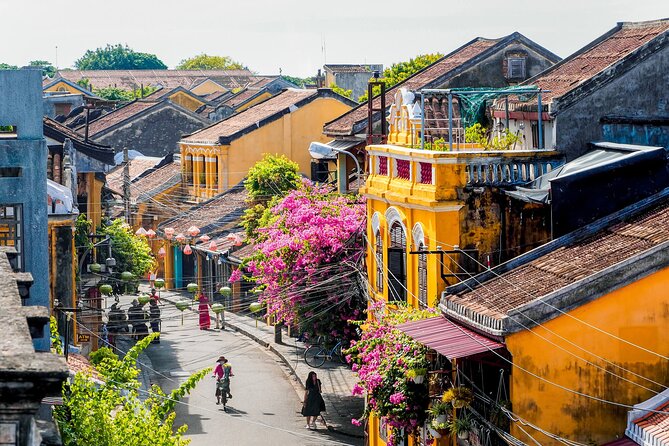 Hoi An Rickshaw Riding/Carpentry or Ceramic Class by Foodie Tour - Walking through the Japanese Bridge and old town