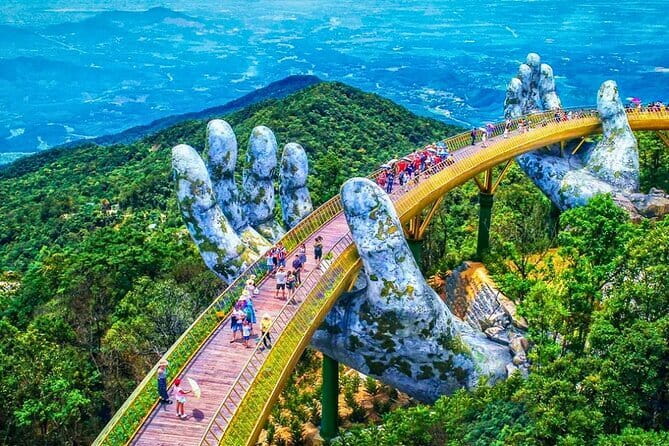 Private Car from Hoi An to Golden Bridge and Back - Afternoon sights: Chain Bridge, Opera Theatre, and Wine Cellar