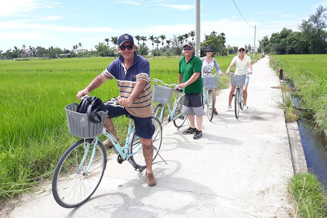 Private Hoi An Countryside: Biking, Basket boat, buffalo, foods - Buffalo ride beside the river and rice paddies