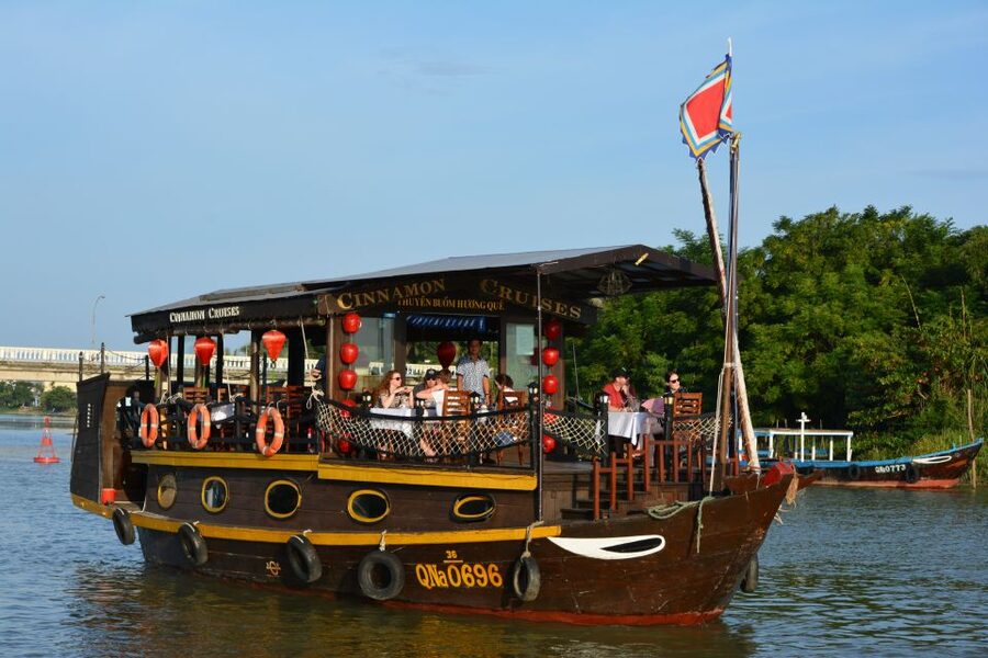 Romantic Sunset Dinner Cruise in Hoi An - The opening drink and outdoor deck