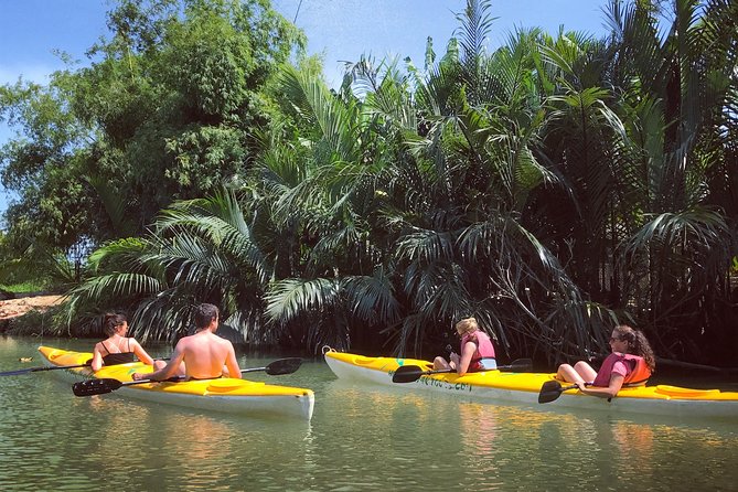 Sunset Paddle and Lantern Town - Paddling through coconut-palm country